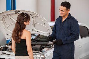 Woman with Mechanic - Meineke Florida Meineke Car Care | Regular Maintenance | Clearwater FL